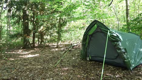 Panorama-view-of-camping-and-perfectly-installed-tourist-tent-in-the-forest