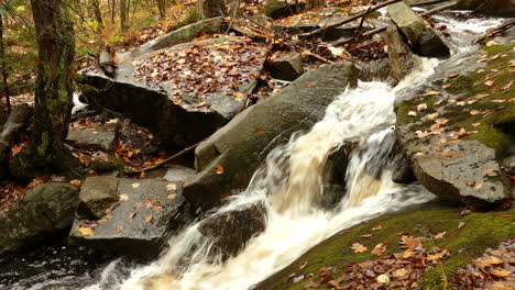 Rapids-Over-Huge-Rocks-Rushing-From-The-Mountain-In-Autumn-Season