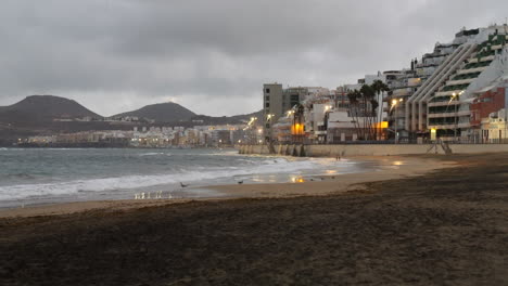 Panoramic-shot-at-dawn-of-Las-Canteras-beach-located-in-the-city-of-Las-Palmas-and-on-the-island-of-Gran-Canaria