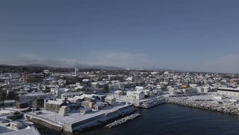 Coastal-town-in-Asia-with-snow-and-winter-sun