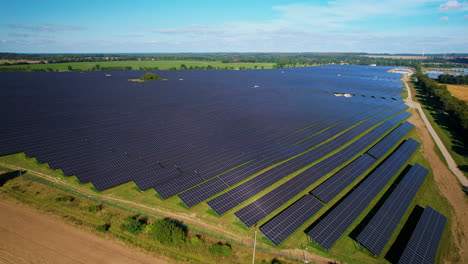 Aerial-shot-over-huge-field-with-solar-power-generation-panels-in-Poland