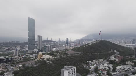 Drone-shoot-at-morning-cloudy-day-at-hasta-bandera-over-obispado-hill-at-Monterrey-City,-Mexico-16