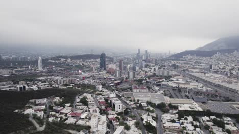 Drone-shoot-at-morning-cloudy-day-at-hasta-bandera-over-obispado-hill-at-Monterrey-City,-Mexico-18
