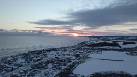 Relaxing-and-calming-aerial-view-of-winter-landscape-with-snowy-beach