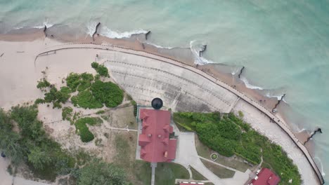 Historic-Point-Betsie-Lighthouse-in-Frankfort,-Michigan-located-along-Lake-Michigan-with-drone-video-overhead-shot