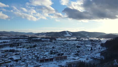 Beautiful-and-inhospitable-town-in-mountain-valley-in-winter-with-snow