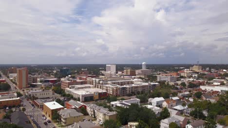 Drone-shot-over-historic-downtown-Pensacola-in-Florida-on-a-very-cloudy-and-sunny-day-1