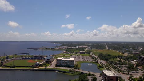 Drone-shot-over-historic-downtown-Pensacola-in-Florida-on-a-very-cloudy-and-sunny-day