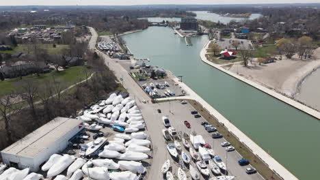 Boats-Storage-Area,-Outside-Nautical-Parking-Dock-for-Sailing-Yachts-and-Leisure-Boats-at-Port-Dalhousie-Pier-Ontario-Canada,-Harbor-Marina-Quay-and-Coastal-Waterfront-Landscape,-Aerial-View