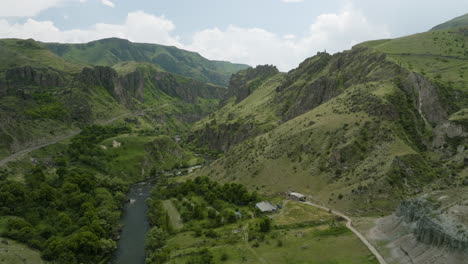 Panorama-Of-Mtkvari-River-Flowing-Between-The-Mountains-With-Green-Vegetation-At-Summer