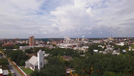 Flying-over-Historic-downtown-Pensacola-Florida-on-a-cloudy-day