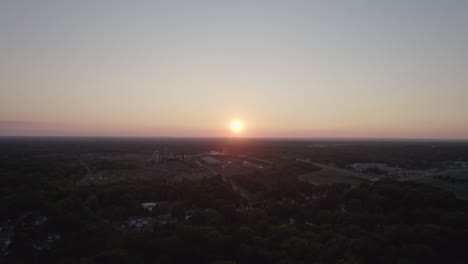 Drone-video-from-a-great-height-shows-the-sun-rising-through-the-clouds