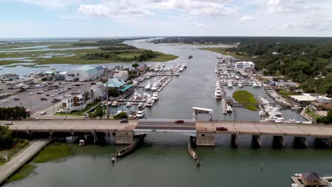 High-aerial-over-draw-bridge-over-the-intracoastal-waterway-at-wrightsville-beach-nc,-north-carolina-near-wilmington-nc