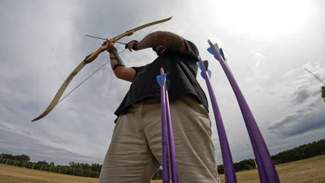 Archer-shoots-multiple-arrows-one-after-the-other-at-an-archery-range