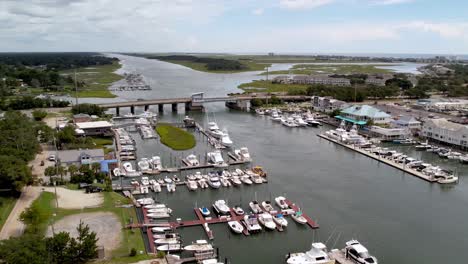 Aerial-draw-bridge-and-marina-at-intracoastal-waterway-at-wrightsville-beach-nc,-north-carolina-near-wilmington-nc
