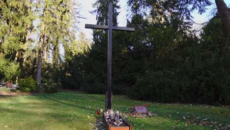 A-close-up-of-the-grave-and-the-big-Christian-cross-in-the-cemetery-in-Szczecin