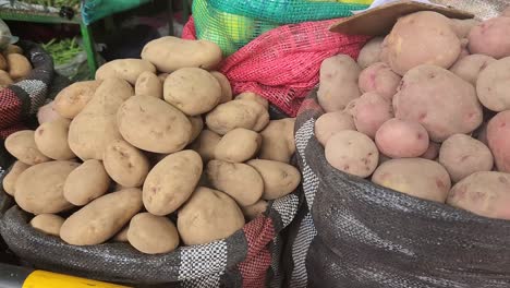 Video-of-sacks-of-potatoes-in-a-market-in-Lima,-Peru