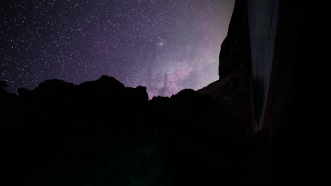 Twisting-time-lapse-of-stars-and-Milky-Way-in-night-sky,-Porto-Katsiki,-Lefkada