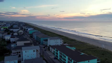 Aerial-push-at-sunrise-over-carolina-beach-nc,-north-carolina-real-estate