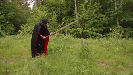 Grim-Reaper-Cutting-The-Large-leaved-Lupine-With-Scythe-In-The-Forest