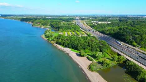 Aerial-of-Charles-Daley-Park-beach-on-lake-Ontario-along-Queen-Elizabeth-Way