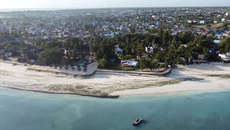 Drone-view-on-Nungwi-village-in-the-North-of-Zanzibar-Island-in-Tanzania,-Africa