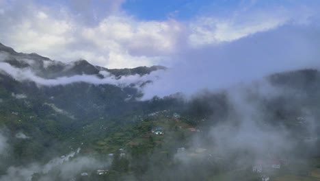 Drone-Shot-of-a-cloudy-Sainj-Valley-in-Himachal-Pradesh-near-Manali,-Kasol-14