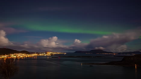 Static-shot-of-northern-lights-over-Alesund-Town-in-More-Og-Romsdal,-Norway-at-night-time-in-timelapse