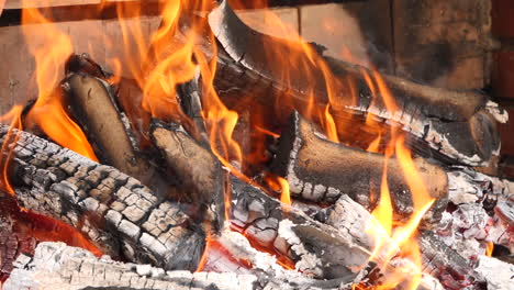 Slow-motion-of-natural-wood-charcoal-grill-with-fire