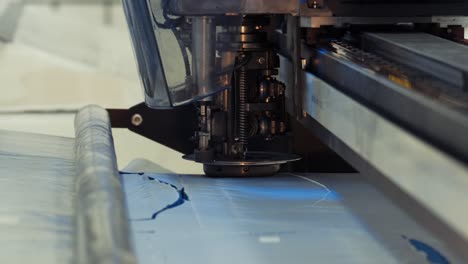Industrial-fabric-cutting-machine.-close-up.4k