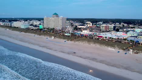 Aerial-push-over-carnival-at-carolina-beach-nc,-north-carolina,-carolina-beach-boardwalk-amusement-park