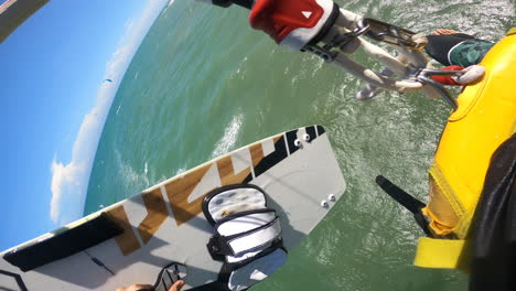 POV-VERTICAL-kite-surfing-in-ocean-water