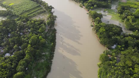 Aerial-Flying-Over-Meandering-River-Through-Tropical-Forest