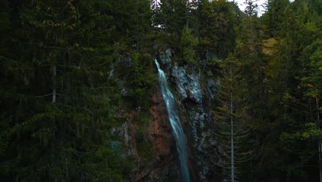 Waterfall-with-fresh-glacier-water-in-the-romantic-and-idyllic-Austrian-Bavarian-alps-mountain-peaks
