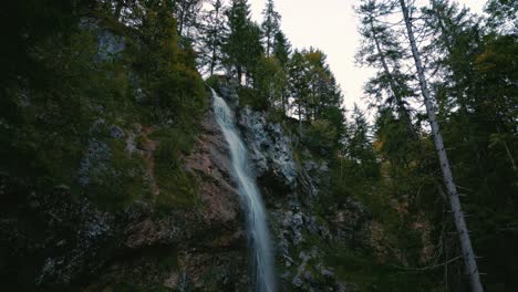 Huge-waterfall-cascade-with-fresh-glacier-water-in-the-romantic-and-idyllic-Bavarian-Austrian-alps-mountain-peaks