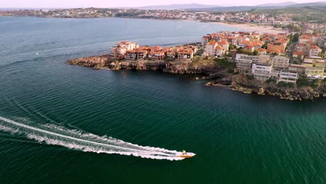 Fast-speed-boat-in-Sozopol-new-town-bay-area,-Black-sea,Bulgaria