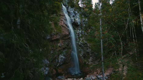 Big-waterfall-cascade-with-fresh-glacier-water-in-the-romantic-and-idyllic-Bavarian-Austrian-alps-mountain-peaks