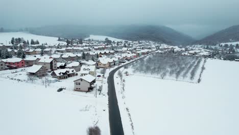 Bacuch-small-town-near-high-tatra-national-park-on-a-heavy-snow-day,-aerial-view