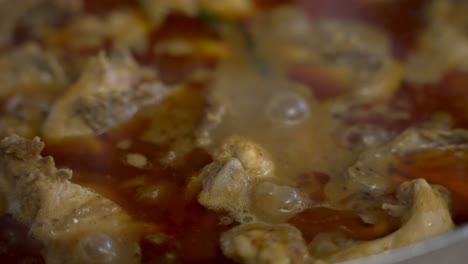 Close-Up-View-Of-Steaming-Hot-Bubbling-Chicken-Curry