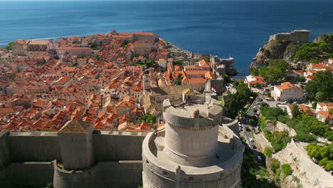 Aerial-view-of-the-watch-tower-and-the-northern-end-of-the-old-town-in-Dubrovnik,-Croatia