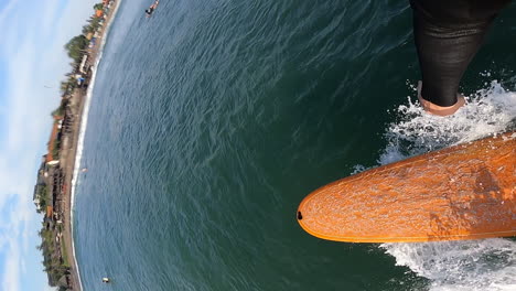 Vertical-pov-surfing-on-ocean-water