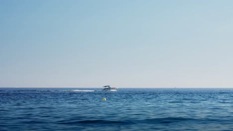 Speedboat-in-slow-motion-with-a-clear-blue-sky