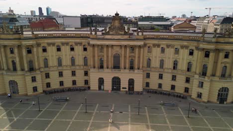 Buttery-soft-aerial-view-flight-panorama-orbit-drone
of-Faculty-of-Law-Humboldt-University-unter-den-Linden-in-Berlin-Germany-at-summer-day-2022