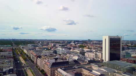 Stunning-aerial-view-flight-pan-to-right-drone-from-Brandenburg-Gate-to-TV-Tower-Cathedral-Palace,-unter-den-Linden-in-Berlin-Germany-at-summer-day-2022