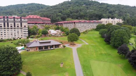 4K-Drone-Video-of-Convention-Center,-Spa-and-Golf-Course-at-Historic-Grove-Park-Inn-in-Asheville,-NC-on-Sunny-Summer-Day-1