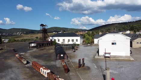 Ancient-mine-tower-and-buildings-of-an-underground-coal-mine-called-Pozo-Julia-in-Fabero-Aerial-view-3