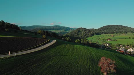 Sequence-of-a-road-in-hilly-landscape-in-Switzerland