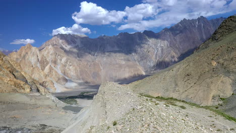 Wide-aerial-shot-of-glacier-path-at-Fairy-Meadows-Pakistan,-cinematic-drone-shot