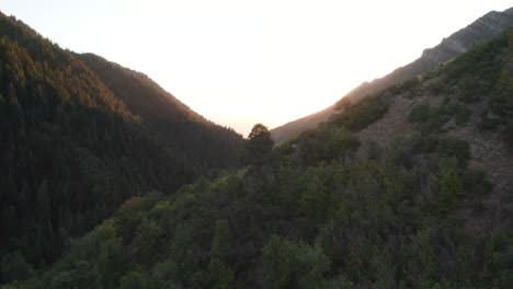 Wasatch-Mountain-Ridge-Aerial-Flyover-in-Utah's-Millcreek-Canyon-at-Sunset