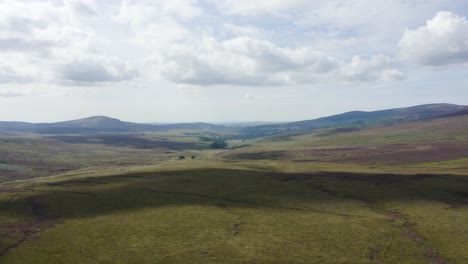 Aerial-view-of-the-infertile-barren-lands-of-Wicklow-mountains-during-the-sunny-day